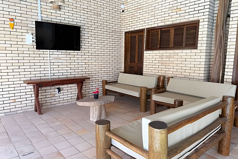 House with a pool and barbecue area in Tibau do Sul.