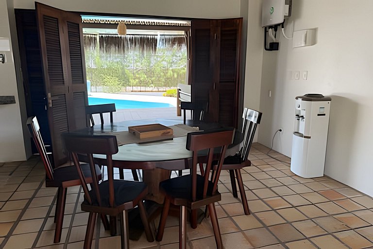 House with a pool and barbecue area in Tibau do Sul.