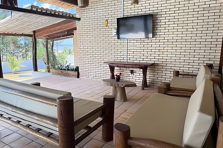 House with a pool and barbecue area in Tibau do Sul.