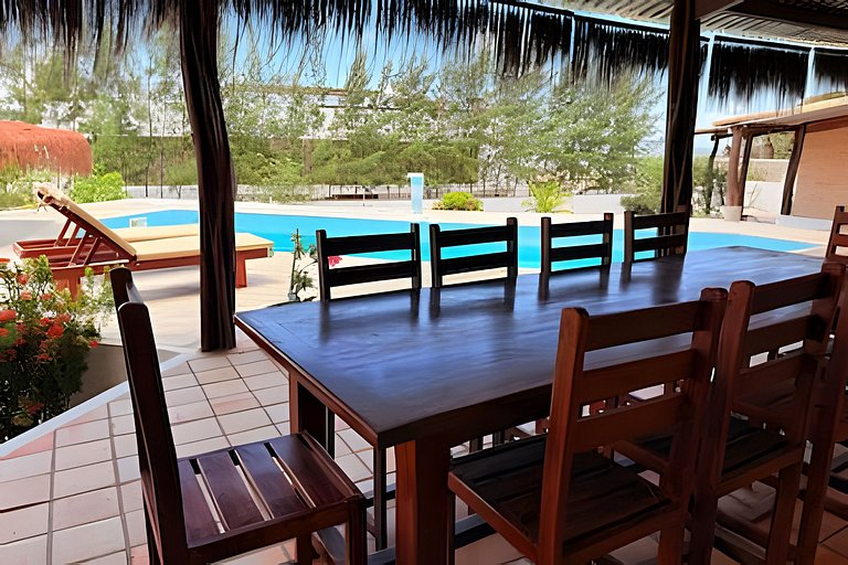 House with a pool and barbecue area in Tibau do Sul.