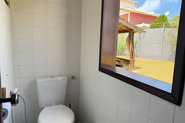 House with a pool and barbecue area in Tibau do Sul.