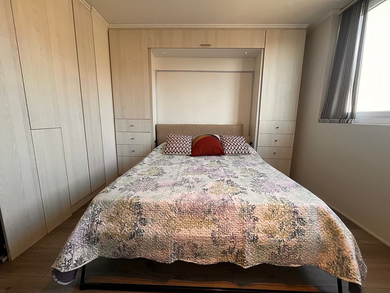 Studio apartment steps from Parque Almagro Metro.