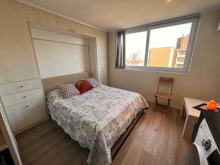 Studio apartment steps from Parque Almagro Metro.