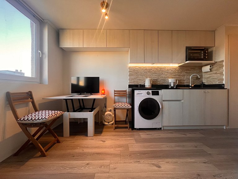 Studio apartment steps from Parque Almagro Metro.