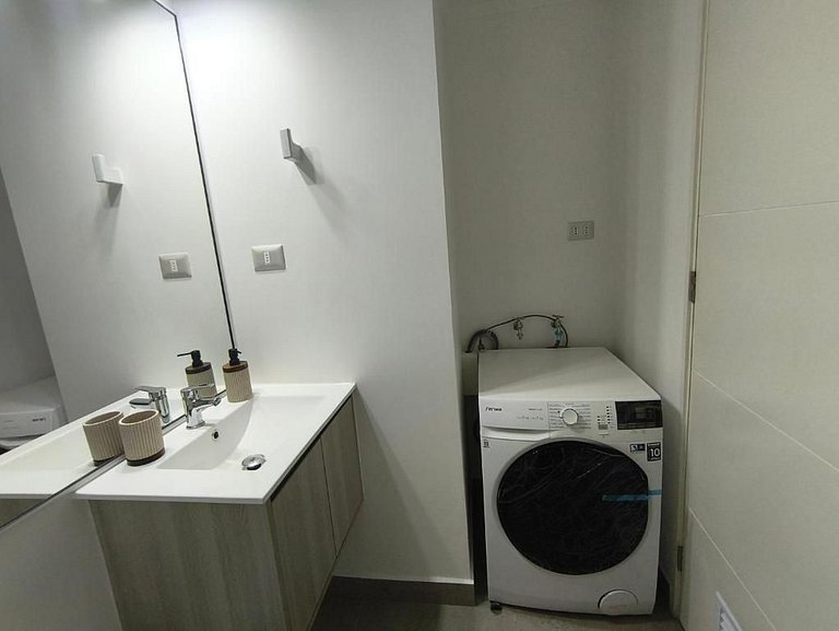 Amplo apartamento com vaga de garagem