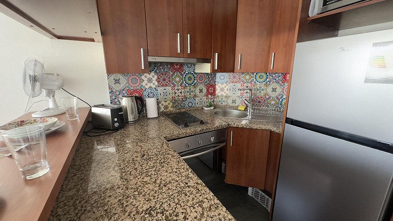 Apartment steps from Mall Alto Las Condes.