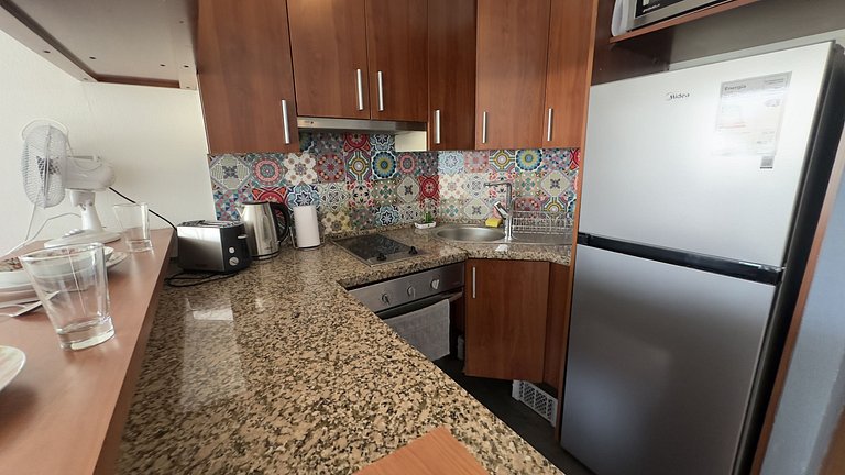 Apartment steps from Mall Alto Las Condes.