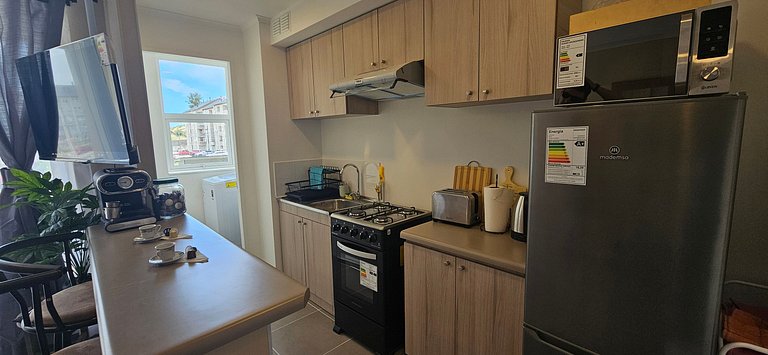 Apartamento confortável com estacionamento e piscina