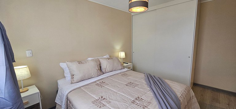 Apartamento confortável com estacionamento e piscina