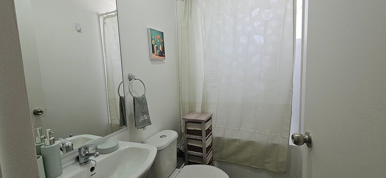 Apartamento confortável com estacionamento e piscina