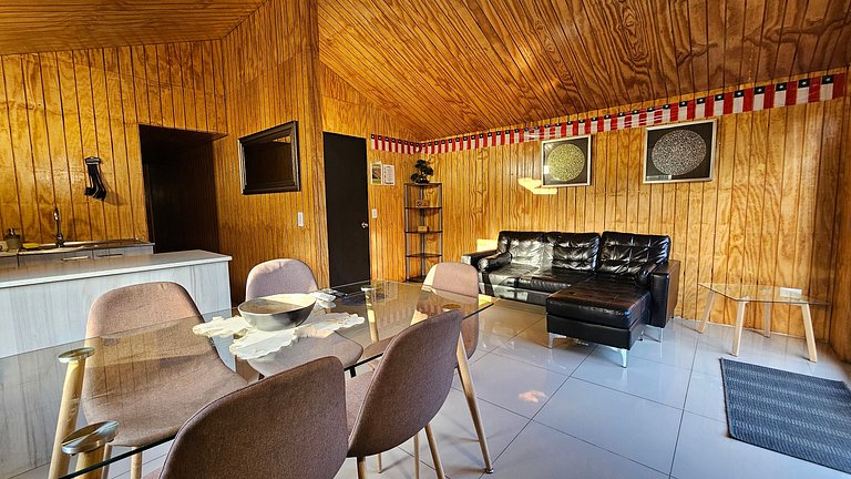 Cabin with green areas, steps from the sea, Curanipe.