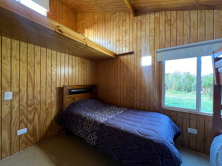 Cabin with green areas, steps from the sea, Curanipe.