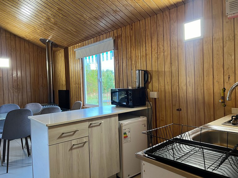 Cabin with green areas, steps from the sea, Curanipe.