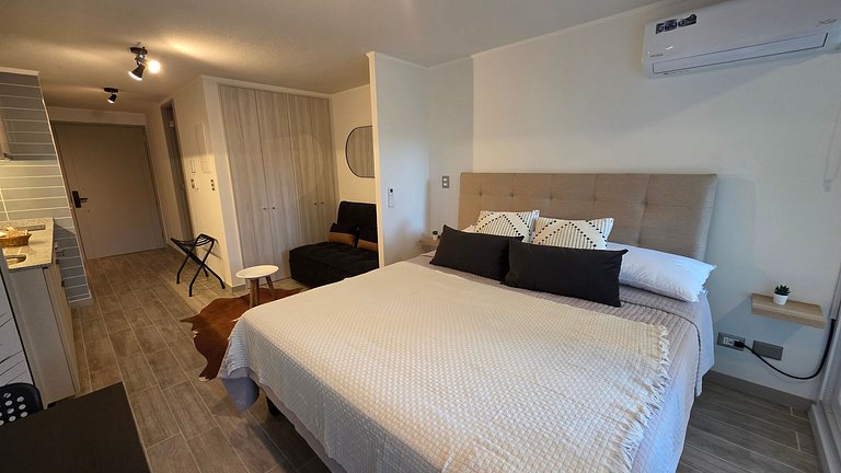 Apartamento com ar-condicionado a minutos da Movistar Arena.