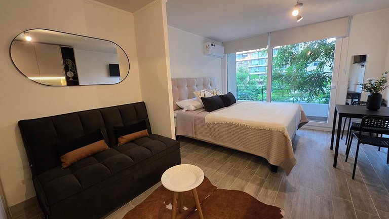 Departamento con A/C a minutos de Movistar Arena.