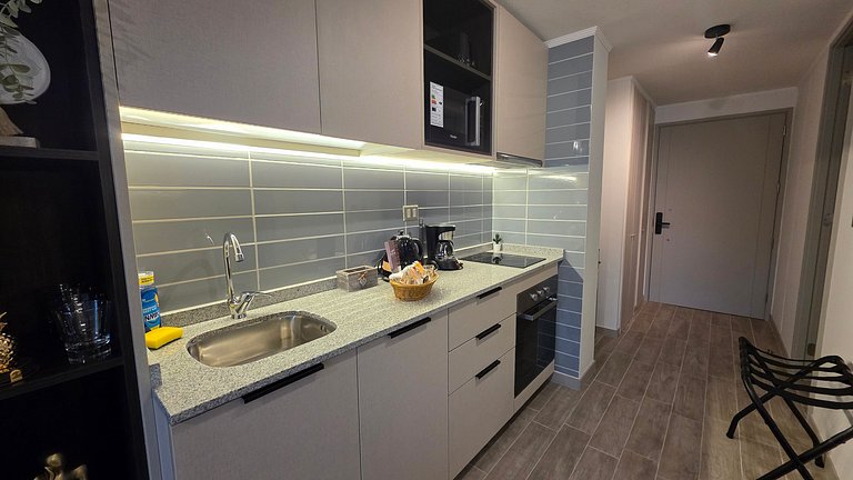 Apartamento com ar-condicionado a minutos da Movistar Arena.