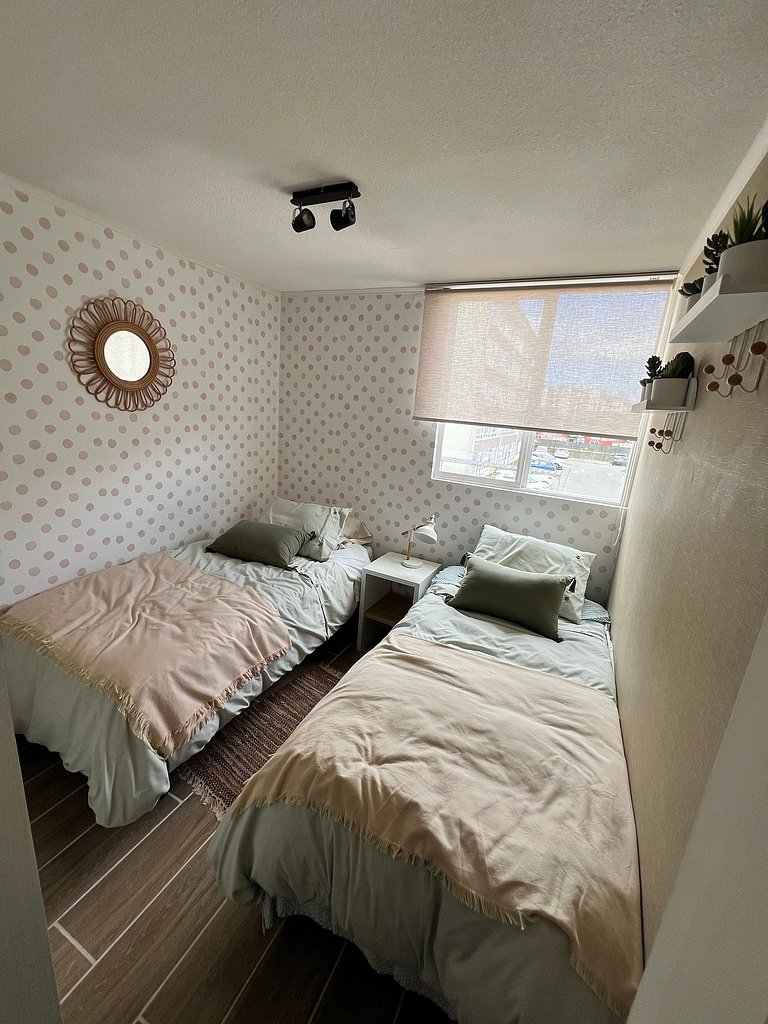 Family apartment facing Puerto Montt Airfield.