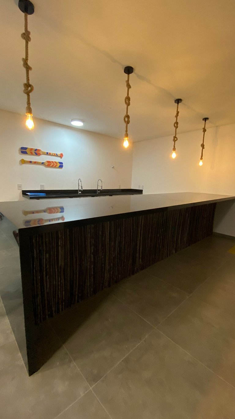 House in a condominium with access to a pool and barbecue ar